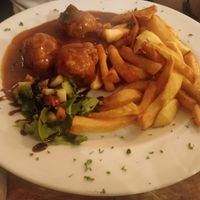 Meatballs with sauce Liège: The sauce is a delicious brown sauce made of carrots, onions and cork syrup (main dish, 17 €). at The Judgy Vegan in Brussels