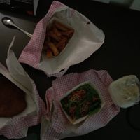 Seitan-Schnitzel with fries, salad and mushroom sauce at The Judgy Vegan in Brussels