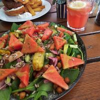 watermelon bowl and burger at The Judgy Vegan in Brussels