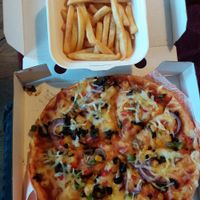 veggie supreme and fries at Zad's in Manchester