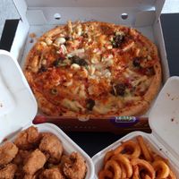 Mac 'n' Cheez Pizza with ZFC and Curly Fries at Zad's in Manchester