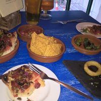 Chillies, special garlic bread and onion rings  at eS Bar in Keswick