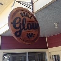 sign outside at Whole Glow Cafe in Cumberland