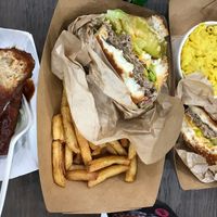Bbq wings, original impossible burgers with fries and Mac and cheese.  at Marty's V Burger in New York City