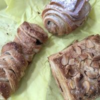 Clockwise from top: chocolate, almond, and strudel .  at La Masa Panaderia in La Paz