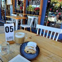 Oat milk Cappuccino and chocolatin, which was crunchy and delicious. I got 2 at La Masa Panaderia in La Paz