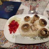 Grilled mushrooms with rice and salad at Nanina Kuhinja in Sarajevo