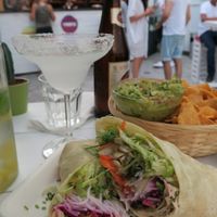 Guacamole with nachos and asian fusion burrito. at Chilantro Garden Bar in Bratislava