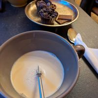 Oat milk and chocolate drops at The Old Chocolate House in Bruges