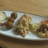 Platter with a glass of coconut milk at Consulado Vegetal in Jardin