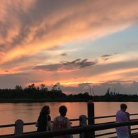 Enjoy the river boats passing and view of the famous battleship while eating vegan brunch at The George on the Riverwalk in Wilmington