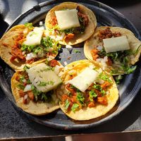 Al pastor tacos 5 for $50 at Por Siempre Vegana Vol II in Mexico City