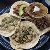 Tacos: Seitan chimichurri, al pastor, cecina, suadero. Comes with onion and parsley but I asked on the side.   at Por Siempre Vegana Vol II in Mexico City