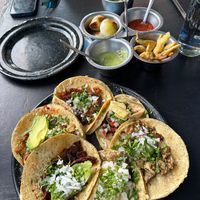 Al pastor, chicharron prensado, big bebé, big tlacuache, seitan al chimichurri, cecina 🌮  at Por Siempre Vegana Vol II in Mexico City
