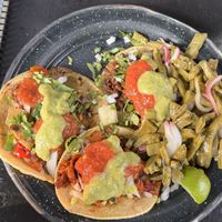 Pastor, Suadero and Alhambre, with stir fried Cactus on the side  at Por Siempre Vegana Vol II in Mexico City
