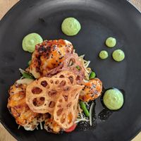 Cauliflower with a raw papaya salad and fried lotus at Pixie and the Hawk in Torrensville