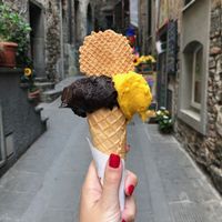 Dark chocolate and mango in a cone! at Gelateria Corniglia in Corniglia