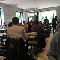 Inside seating at Saravana Bhavan in New York City
