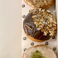 coffee & walnut, peanut butter, and vanilla pistachio donut  at The Rolling Donut - Dublin 2 in Dublin