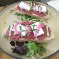 toast with red beetroot hummus & vegan feta at Vero Caffe in Bruges
