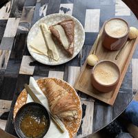 Pear cake, Croissant, Cappuccino with oat milk at Vero Caffe in Bruges