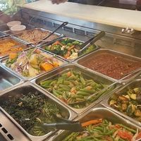 Veggie options along with MAC-N-CHEESE and drumsticks and ginger chicken. Select 4 options for  $8.75.  at Veggie Castle in Jamaica