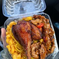 Small meal with Mac n cheese, lo mein, ginger chicken, and a drumstick  at Veggie Castle in Jamaica