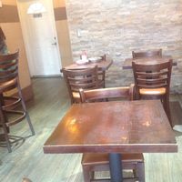 The dining area, they  also have highchairs by the way. at Veggie Castle in Jamaica