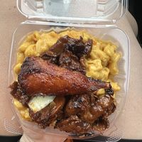 Small meal with Mac n cheese, ginger chicken, added bbq drumstickks  at Veggie Castle in Jamaica