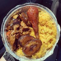 Medium meal with ginger chicken, bbq drumsticks, and double Mac n cheese at Veggie Castle in Jamaica