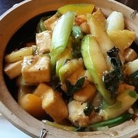 Nr 39- Stir-fried organic tofu with fresh vegetables, oyster mushrooms, lemongrass, sesame seeds and sweet basil in a clay pot. Gorgeous. at Bun Bo Hue in Stockholm