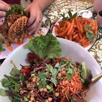 Salad with tempeh, sweet potato fries and a falafel burger- way too much food but amazing!  at The Organic Boho in Copenhagen