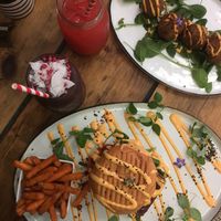 Tempeh burger and falaffel. "I am Joyful" smoothie and "I am glowing" juice.  at The Organic Boho in Copenhagen