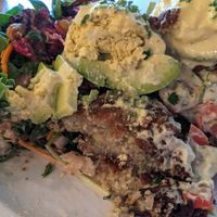 Latkes Benechick with avocado topping option at Chickpea Restaurant in Vancouver