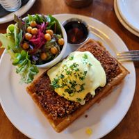 Shnitzel waffle benechick at Chickpea Restaurant in Vancouver