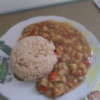 Brown rice and mixture of beans peas carrots and potatoes at Govinda in Chiclayo