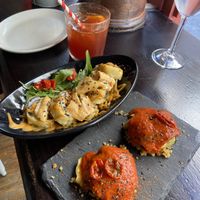 Tempura vegan sushi and stuffed zucchini sachets  at La Bartola in Sevilla