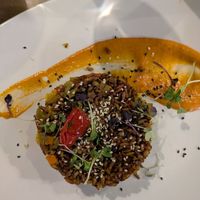 Arroz rojo Thai con verduras y salsa romescu at La Bartola in Sevilla