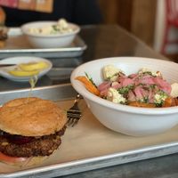 House-made vegan burger and the vegan poutine. at Chic Shack in Quebec
