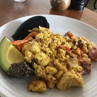Tofu scramble with avocado. Delicious and lite with a tiny bit of spice just for flavor. A ton of flavor. $17 at BSKT Cafe in Mermaid Beach