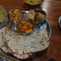 Samosas and two different sabjis, with vegan bread at Om Namo in Minsk