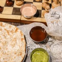 chickpea naan with green tamarind and garlic chutney at Om Namo in Minsk