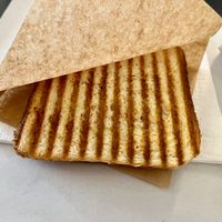 Vegan toast with “cheese” and “meat” slices at Fari's in Ljubljana