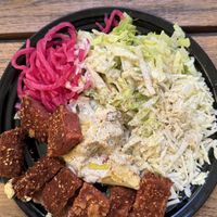 Salad with chicken protein options  at Fari's in Ljubljana