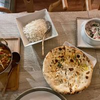 Raita. Rice. Aloo naan and jalfrezi   at Spice Garden in Sitges