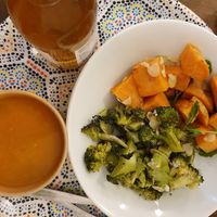 Carrot/cumin soup with sweet potato and broccoli on the side + green tea lemon ice tea at Yem'a Paris in Paris