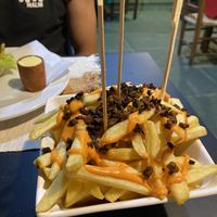 Batata frita com cheddar e bacon vegano  at Ser-Afim Restaurante Natural in Maceio