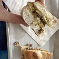 Mini vegan breakfast bagel: all veg butter, crispy sausage, cheese, and tofu egg   at Anaya Coffee in Melbourne