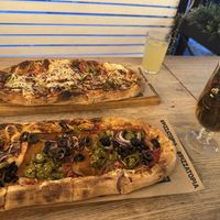 Pizza with vegan mozzarella and vegan bacon , one with extra chilli’s   at Pizzatopia in Krakow