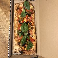 V cheese, mushrooms, corn,tomatoes, olives, jalapenos, pepper and spinach pizza at Pizzatopia in Krakow